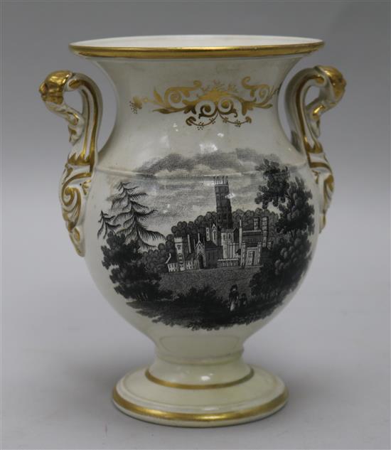 A pottery vase decorated with a view of Eton College and Fonthill Abbey